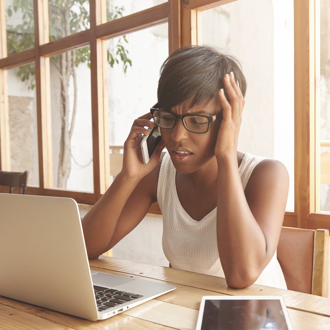 Young woman frustrated with slow a slow loading website