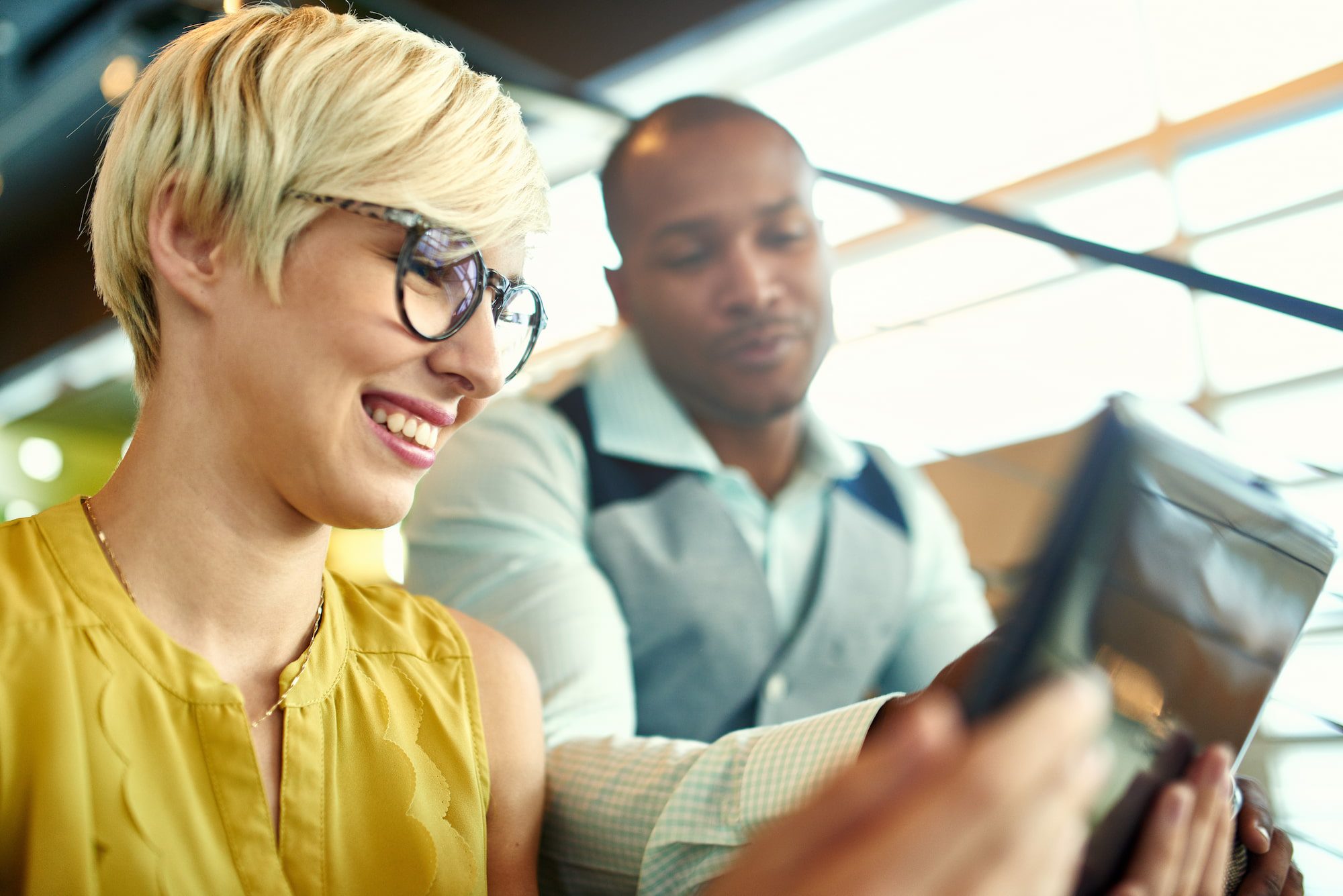Business owners reviewing digital advertising strategies.
